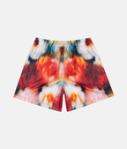 Vue arrière du short de sport 4Handle falling flower, montrant l'effet miroir du motif floral multicolore continu.