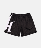 Vue arrière du short de sport 4Handle Just Handle Dune Black, mettant en valeur le motif graphique continu effet mesh noir et le logo blanc enveloppant la jambe.