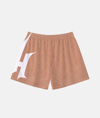 Vue arrière du short de sport 4Handle Just Handle Dune, mettant en valeur le design continu texturé aux tons neutres.