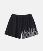 Vue arrière du short de sport 4Handle on fire gray, montrant le design asymétrique avec les flammes grises enveloppant l'arrière de la jambe.