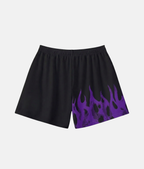 Vue arrière du short de sport 4Handle on fire purple, montrant le design asymétrique avec les flammes violettes enveloppant l'arrière de la jambe.