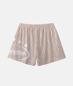 Vue arrière du short de sport 4Handle Sandwave, mettant en valeur la continuité des lignes du motif zébré et le logo blanc enveloppant la couture latérale.