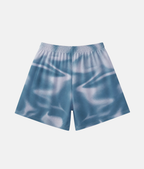 Vue arrière du short de sport 4Handle Shooting Blue, mettant en valeur les reflets et les nuances de bleu du design continu.