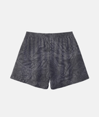 Vue arrière du short de sport 4Handle, mettant en valeur le motif de texture marbrée sombre continu sur l'ensemble du tissu.
