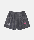 Short de sport 4Handle avec motif texturé marbré gris foncé et noir, rehaussé par un logo 4Handle rose et blanc.