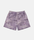 Short de sport 4Handle soft skin avec motif tie-dye effet marbré violet clair et gris, logos blancs imprimés sur le bas.