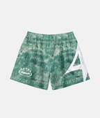Short de sport 4Handle strange word green avec motif tie-dye texturé vert émeraude et blanc, logo ovale imprimé et grand logo blanc asymétrique sur le côté.